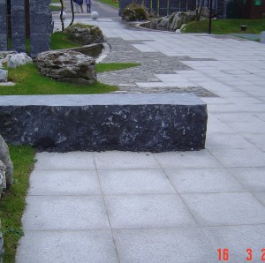 Antique granite cobblestone alongside Granite paving